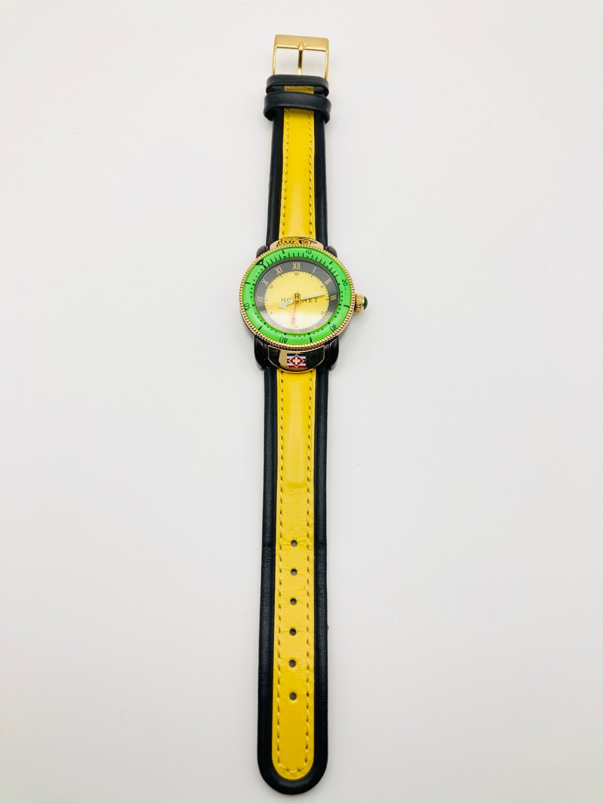 Swiss Hawaiian Le Hornet yellow leather wristwatch