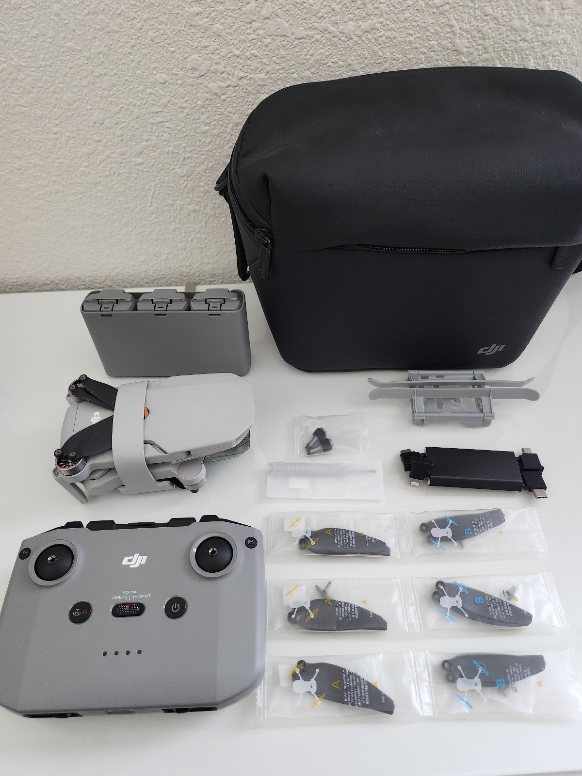 DJI Mini 2 Fly More Combo – Ultralight Foldable Drone, 3-Axis Gimbal with 4K Cam