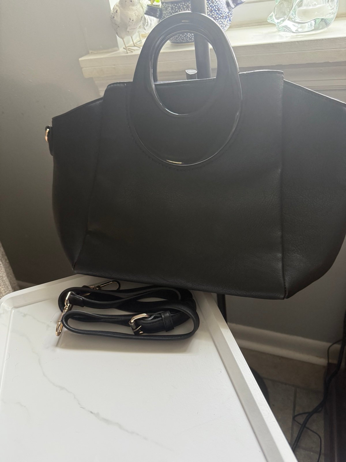 Handbag with resin handle