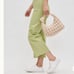 NWT Woman’s Urban Expressions Cream Quilted Baguette With Knot Hand Bag