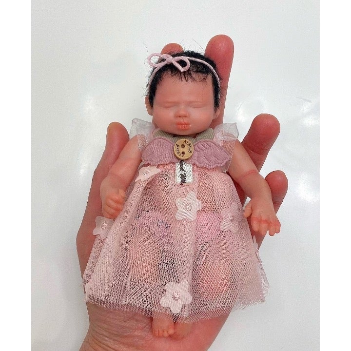 miniature baby dolls