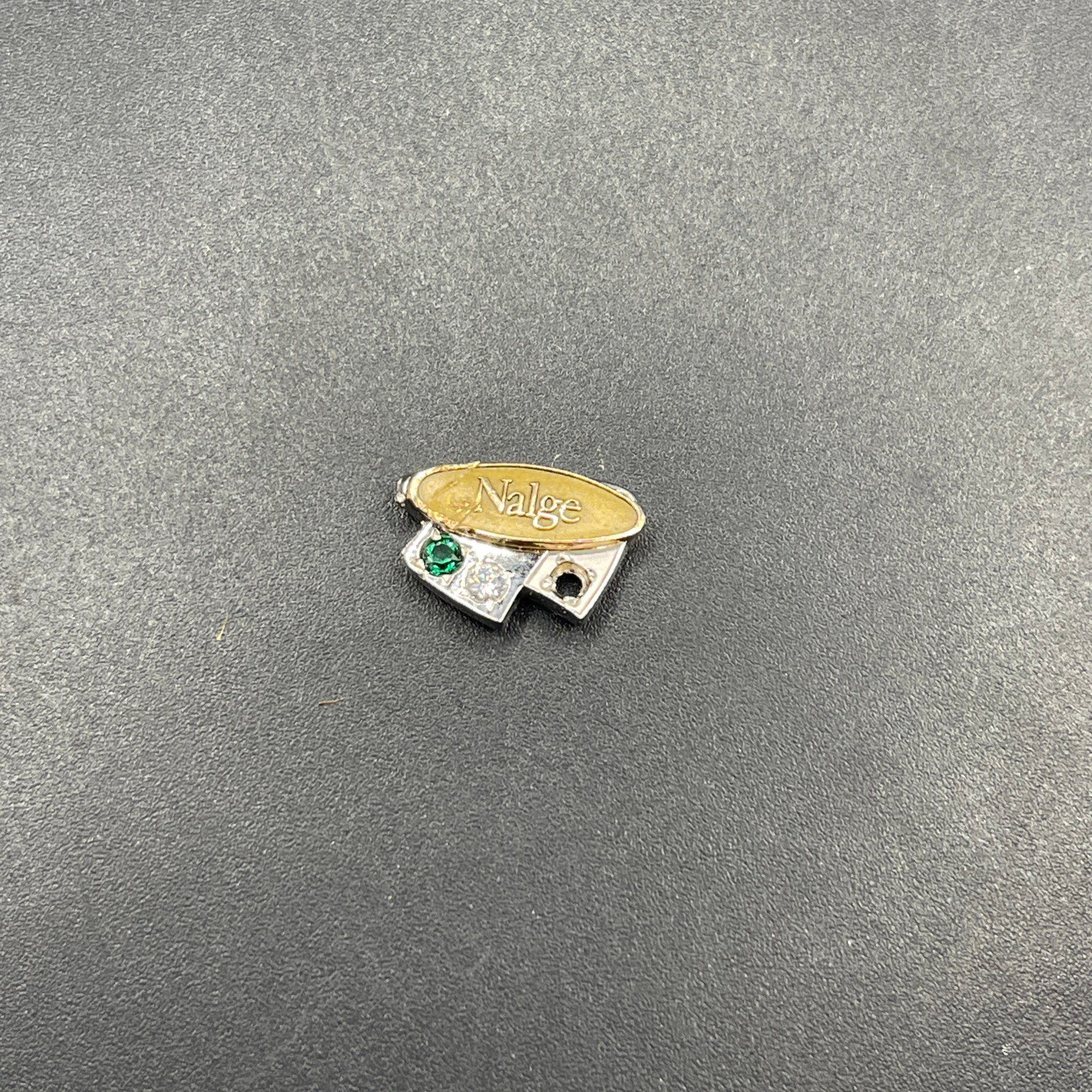 Emblem Nalge W/ Diamond And Emerald Missing 1 Stone Damaged 032723@