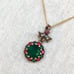 Vintage sterling 4.3carats green emerald, rubies and diamond pendant