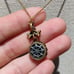 Vintage sterling 4.3carats green emerald, rubies and diamond pendant