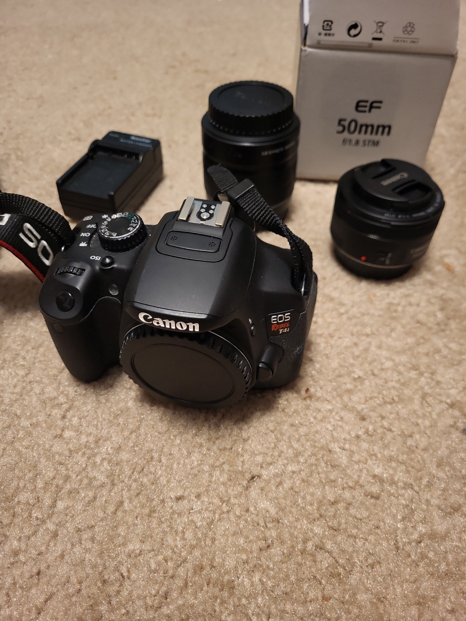 Canon Rebel T4i DSLR w/18-55 IS & Canon EF 50mm f/1.8 STM Lens.