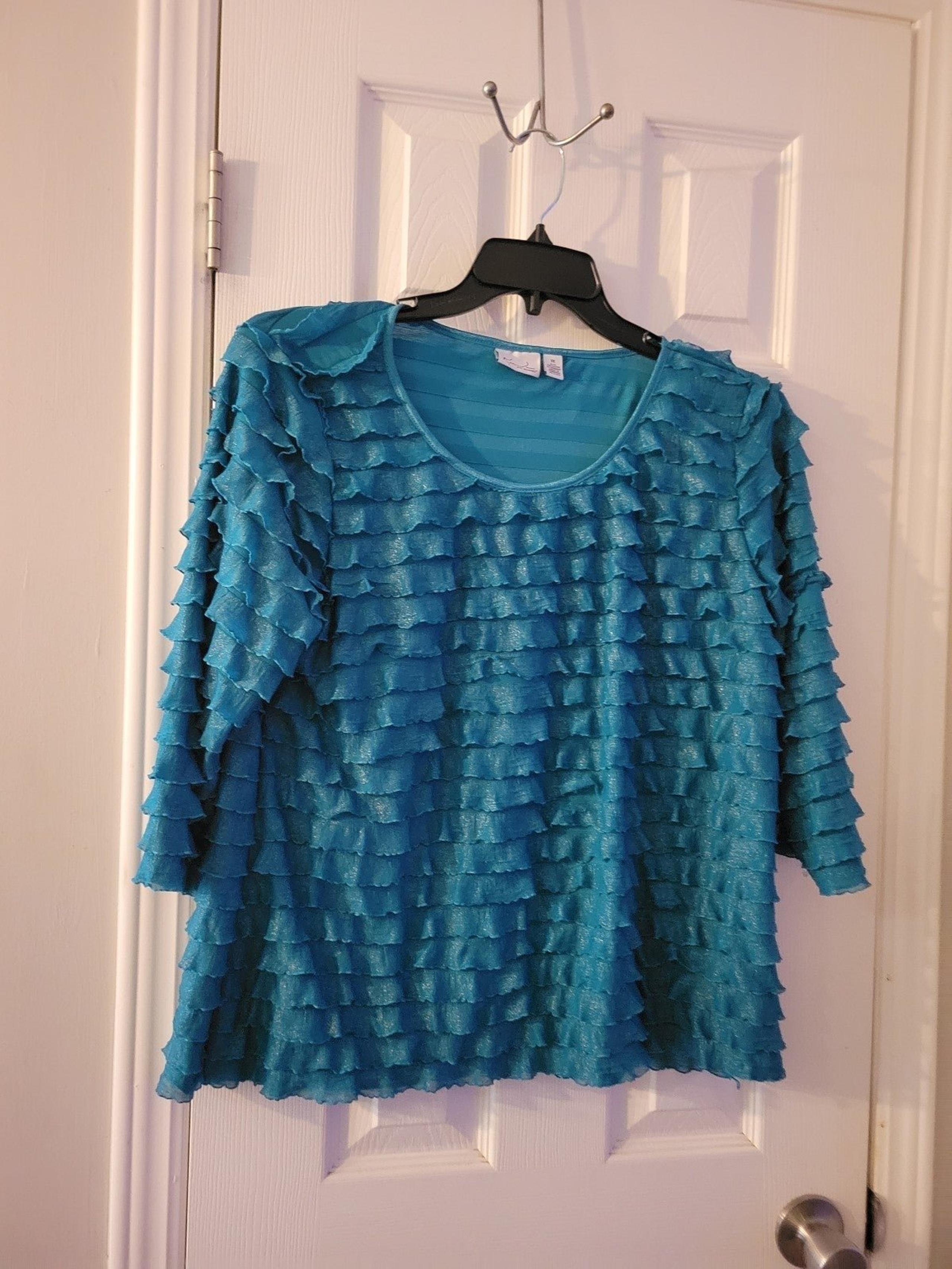 1x knit Kim Rogers top