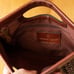 VIN Etienne Aigner Reddish Brown Woven Leather Clutch