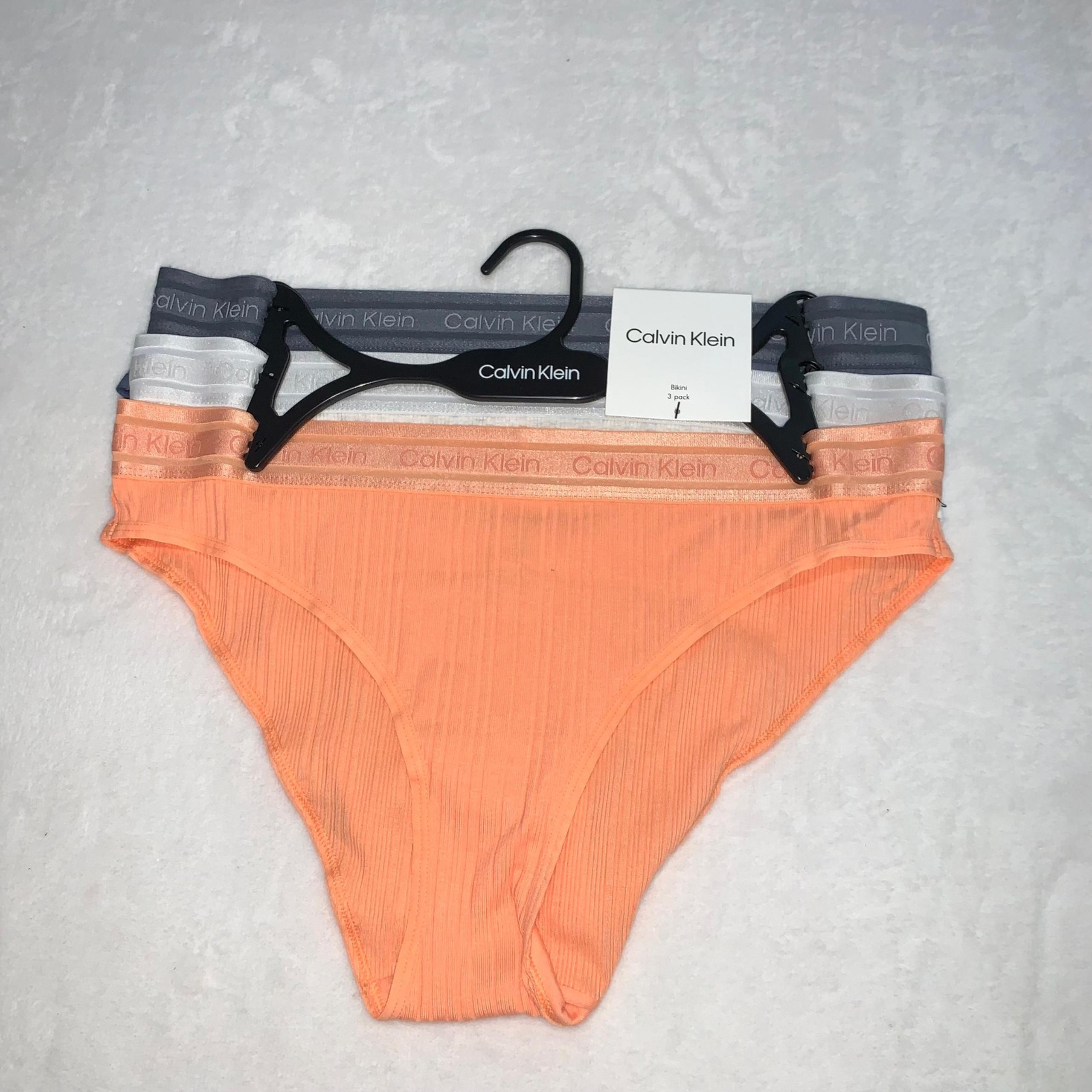 Calvin Klein three pairs of bikini style panties orange gray blue new