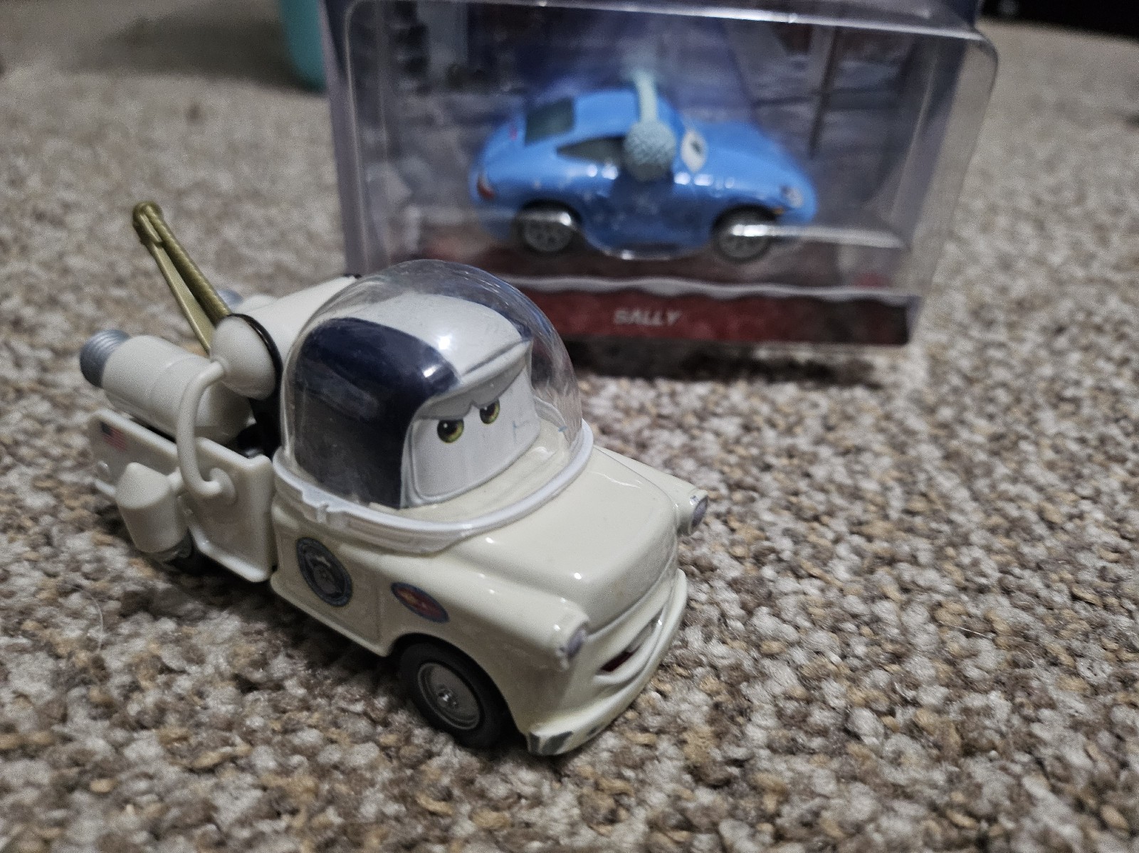Disney Pixar Cars mater astronaut and sally