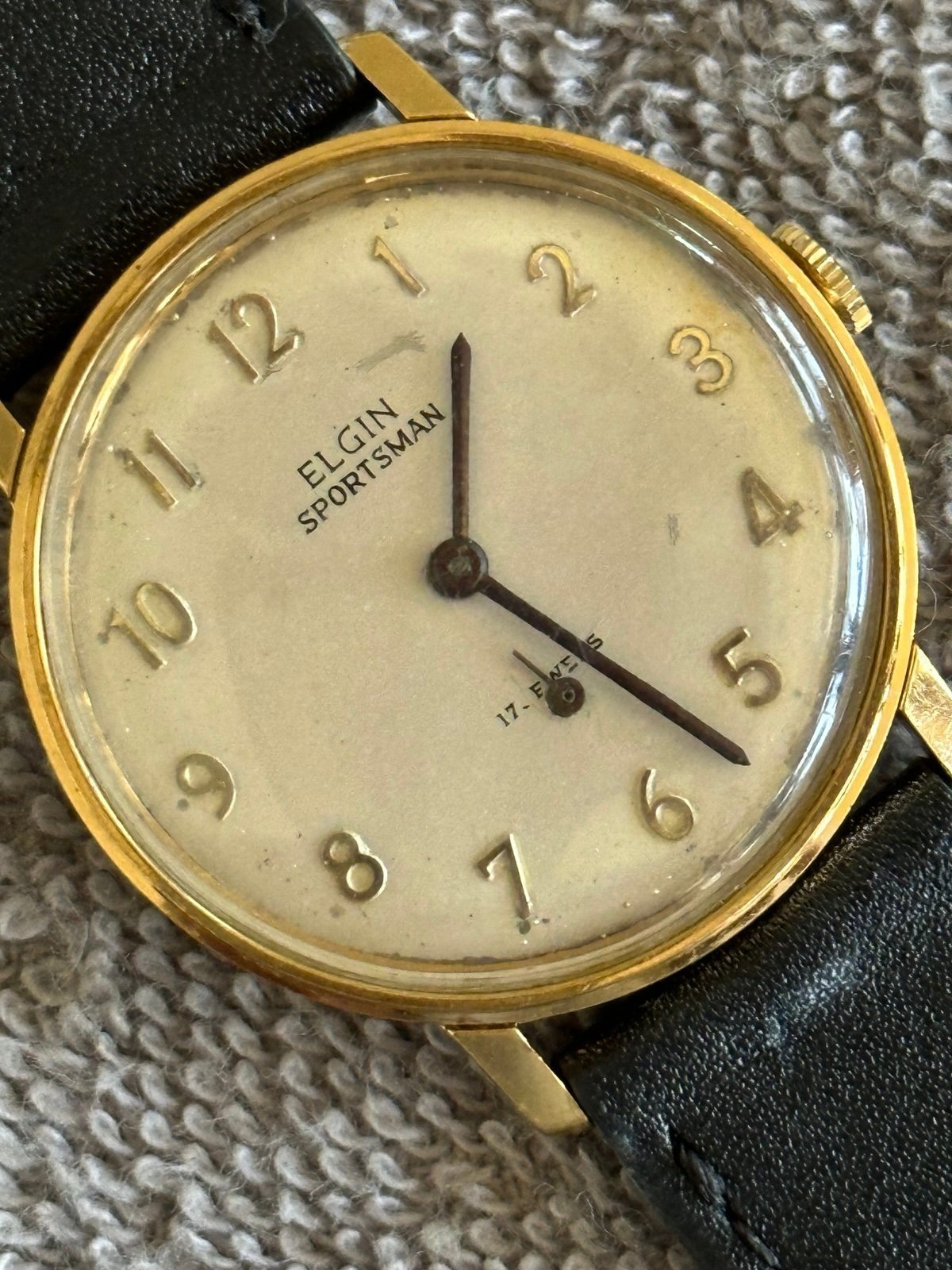 Vintage Elgin Sportsman gold tone, manual wind up, 17 jewels. Clear back.