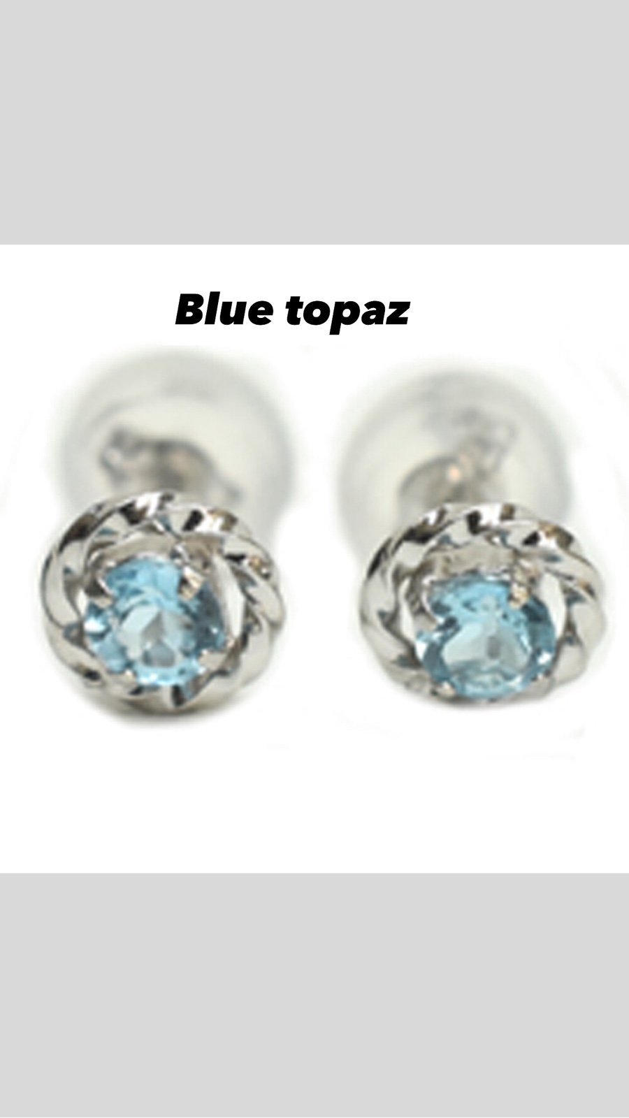 Natural blue topaz in 10k white gold setting