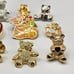 Lot of 10 Teddy Bear Lapel Pins Rhinestone Enamel Gold Tone Metal Pinbacks Vtg