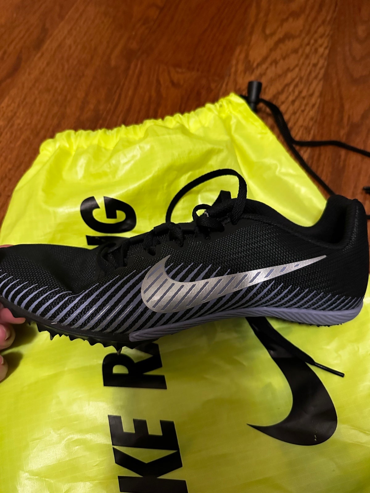 Never worn!! Nike running spikes