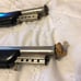 Vintage Captain Hook Cork Gun Tin Toy
