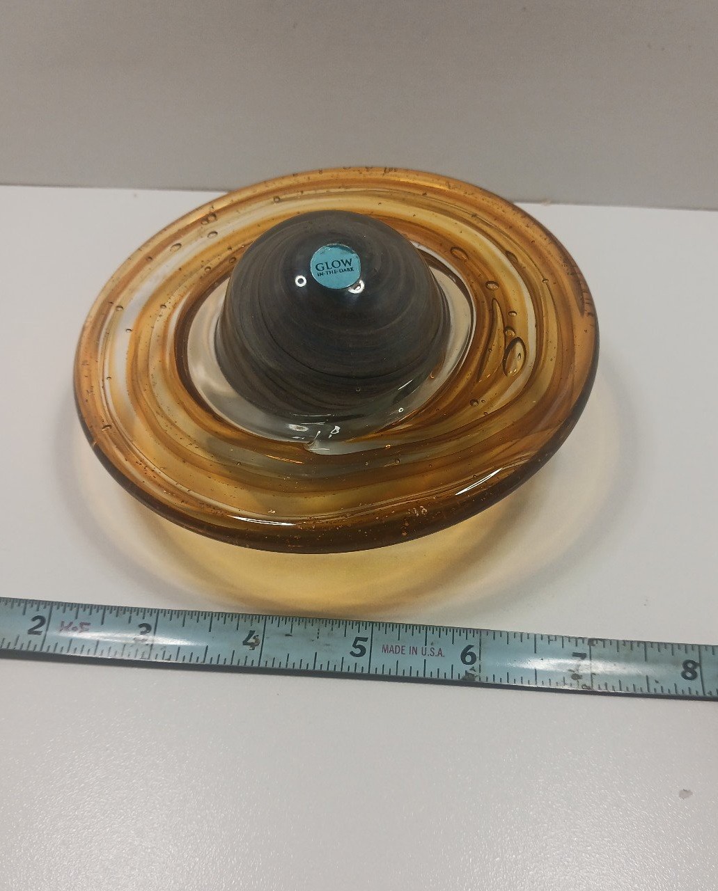 DYNASTY GALLERY'S HANDBLOWN GLASS PLANET SATURN PAPER WEIGHT GLOWS IN THE DARK