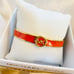 MICHAEL KORS Haute Gold Tone Orange Coral Enamel Bangle Bracelet