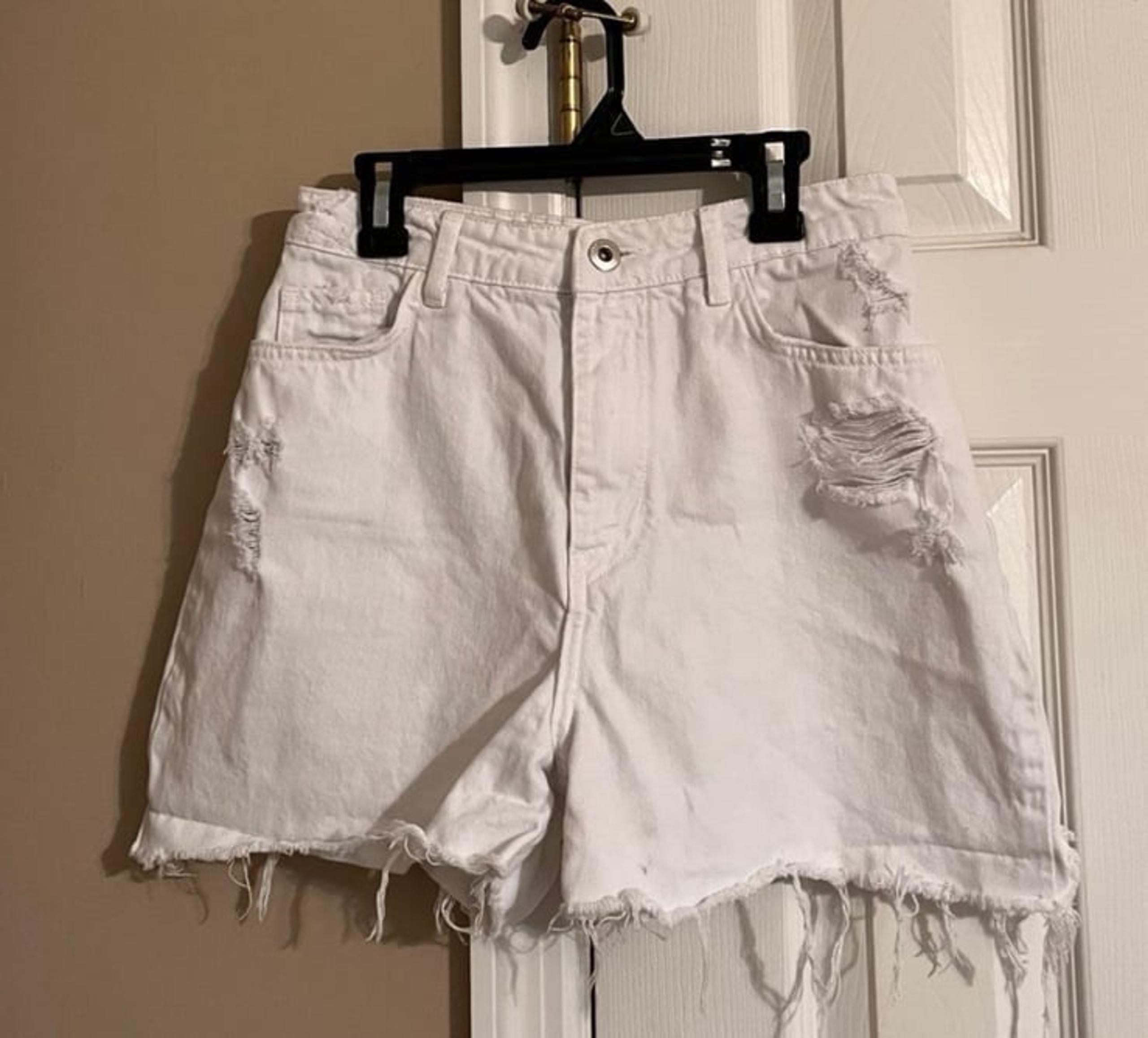 Zara white distressed high waisted denim shorts. Women’s size 4.