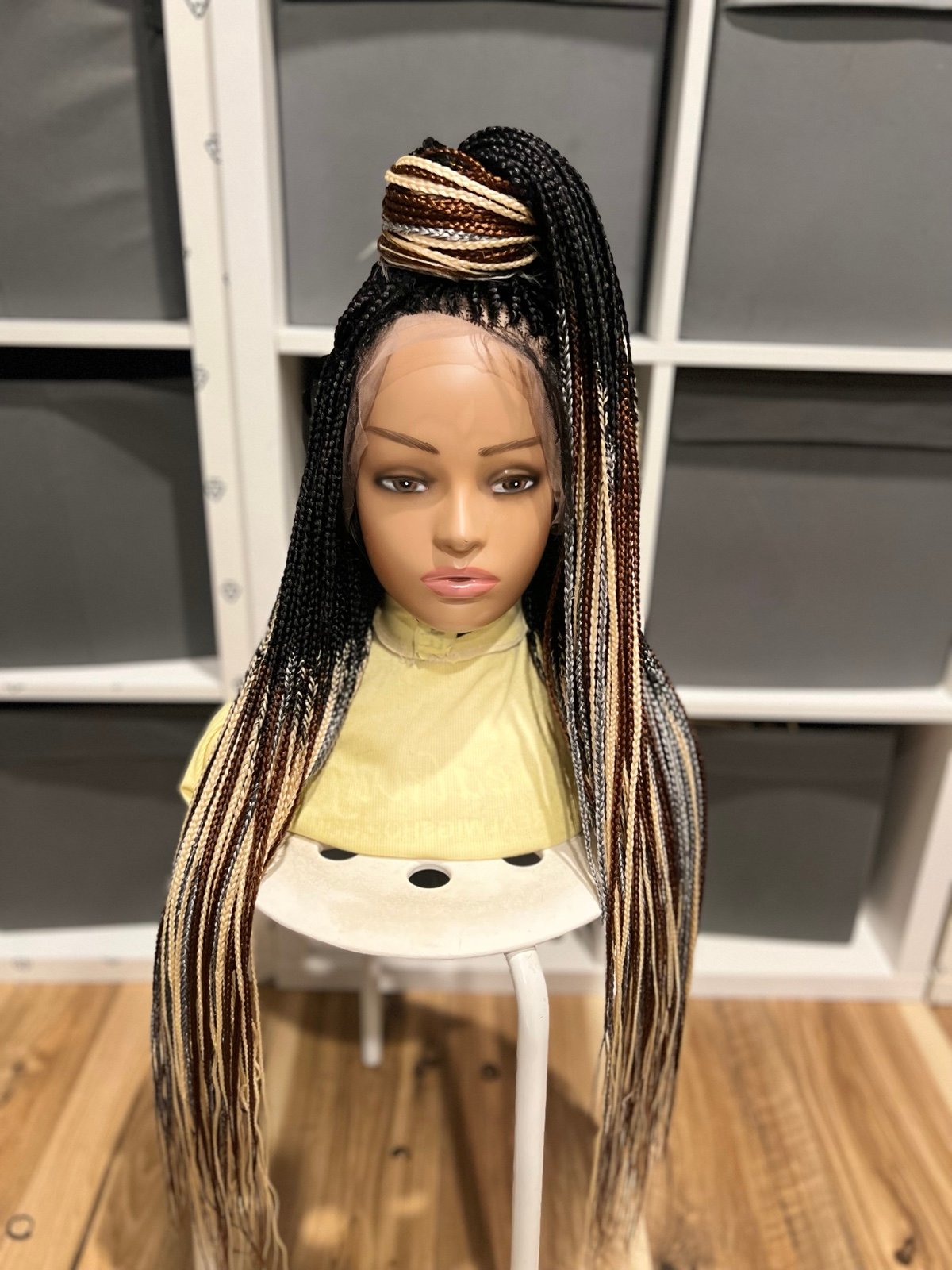 4 tone braided wig. Made on a lace frontal. Length is 28inches.
