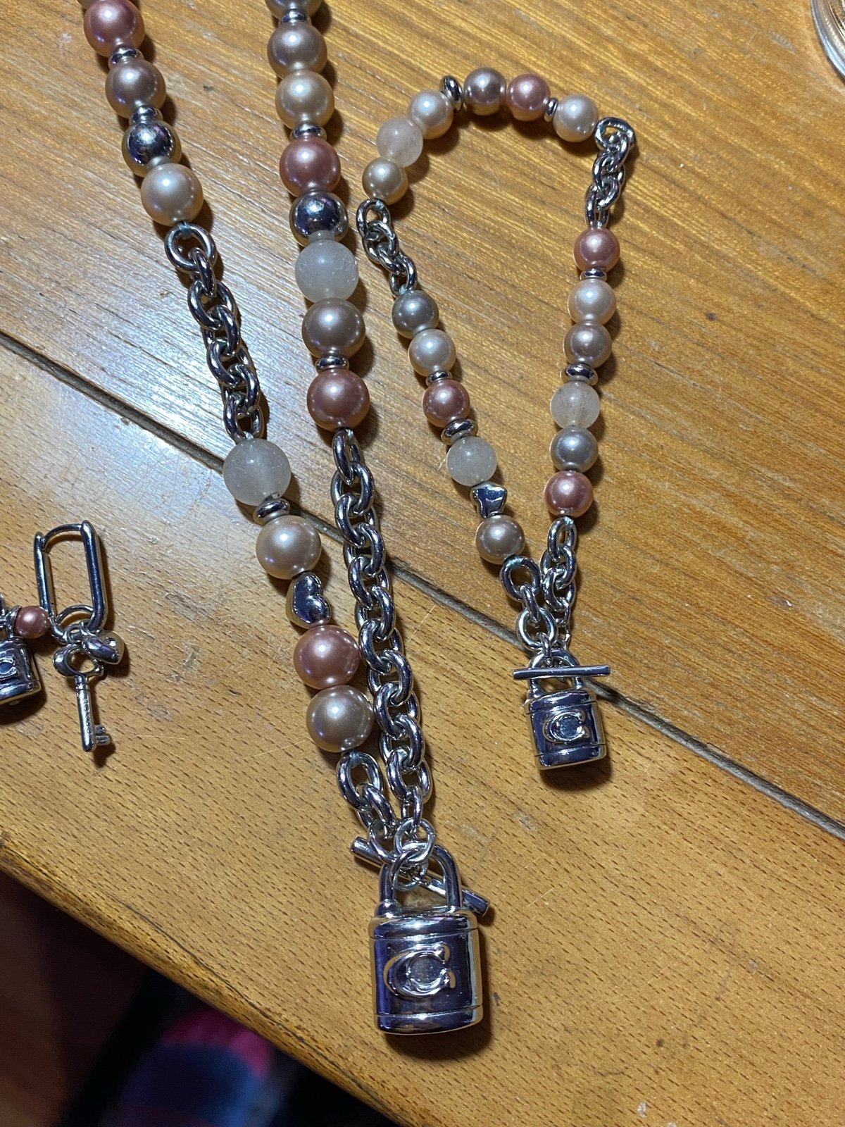 NWOT 3 pc Coach shades of pink pearl toggle lock and key jewelry set