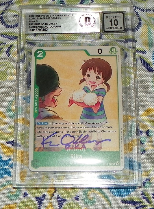 Kate Oxley Rika One Piece Signed Card Game 10 Auto Grade BAS ST12-007 Beckett