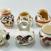 Set of 6 Native American Indian Life and Legends Pottery Series Pots Vase
