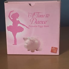 Porcelain pirouette piggy bank