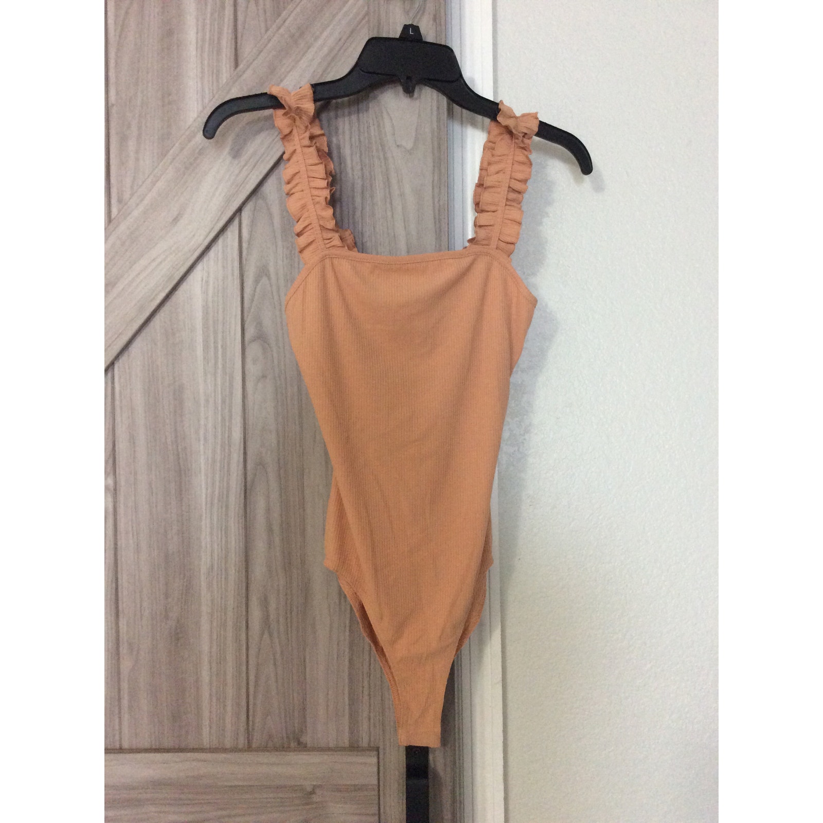 NWT Le Lis Small pale orange ruffle strap bodysuit