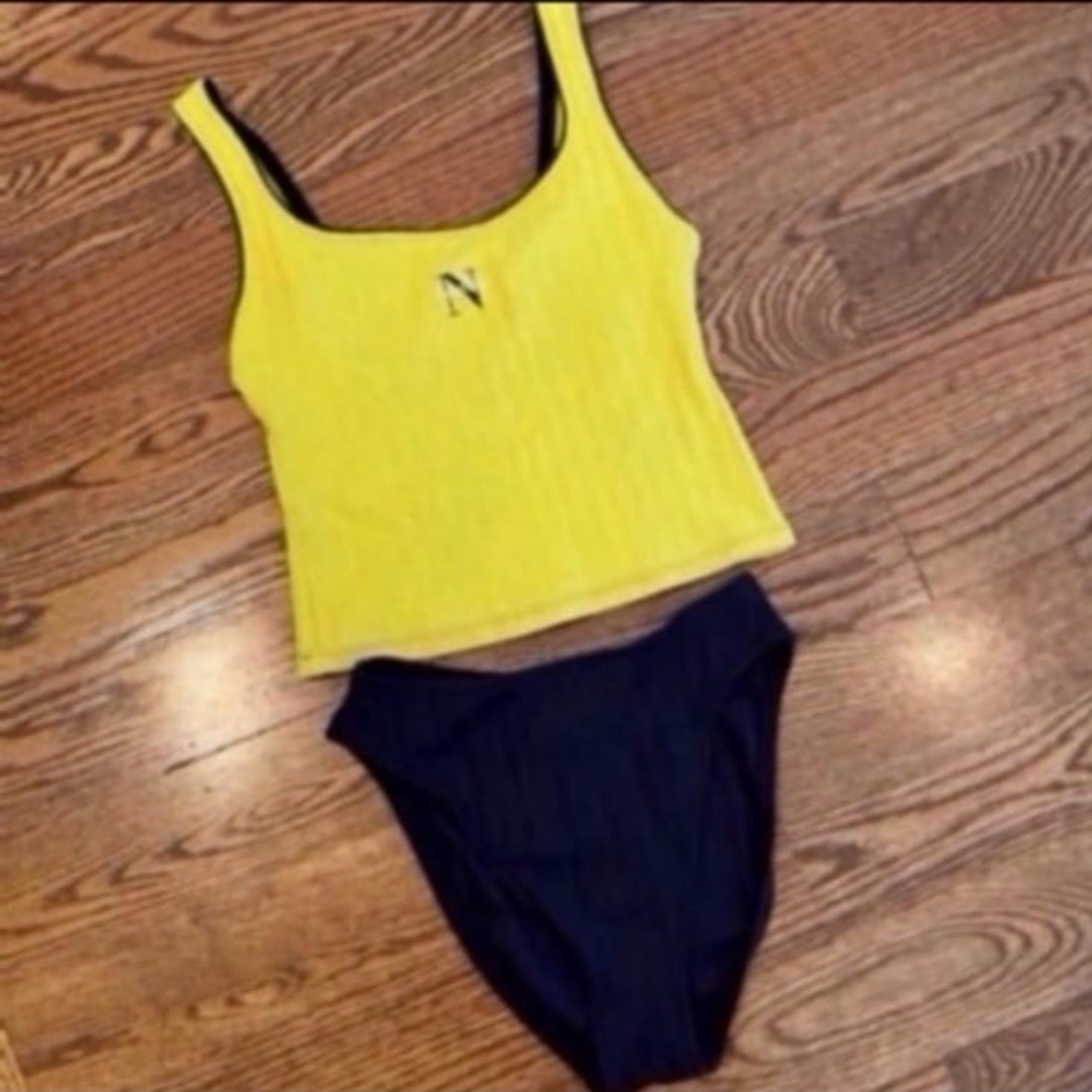 Women nautical navy and yellow tankini bathing suit.