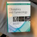 Obstetrics and gynecology book with work book