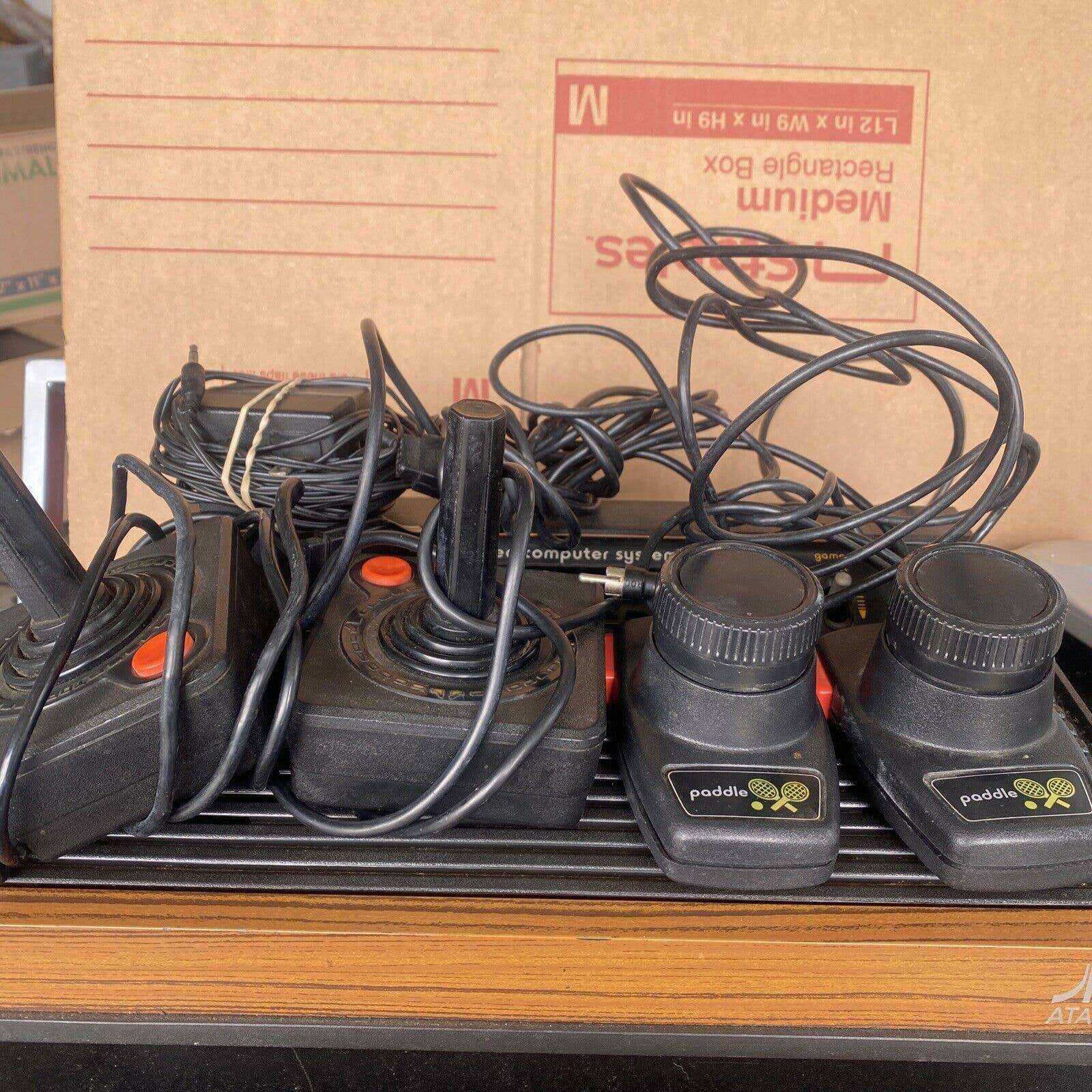 Atari 2600 Video Game Console with controllers
