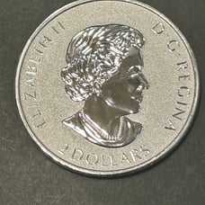 Canadian 3/4 ounce (free BU 1960 toner penny with purchase)