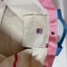Harvey’s Sara Lyons beach bag with hotel tag