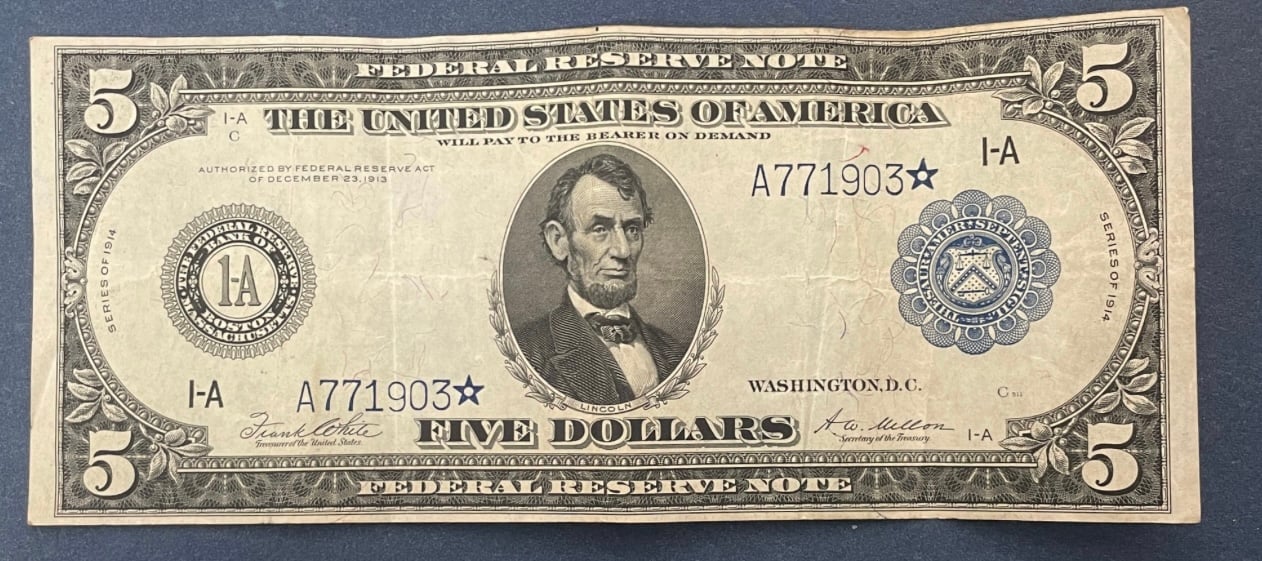 Extremely rare 5 dollar star note 1914 serie very nice condition