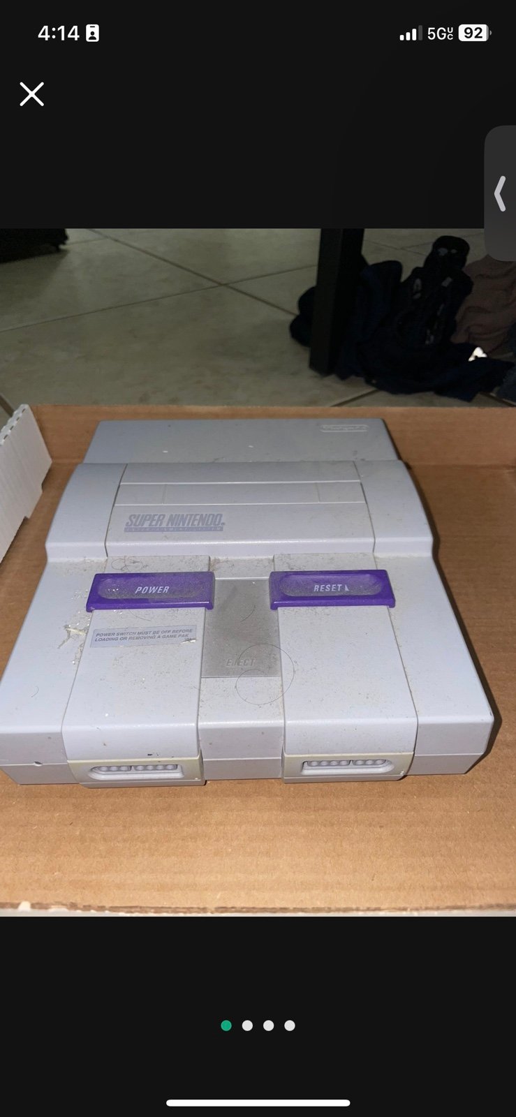 Super Nintendo - two controllers four games