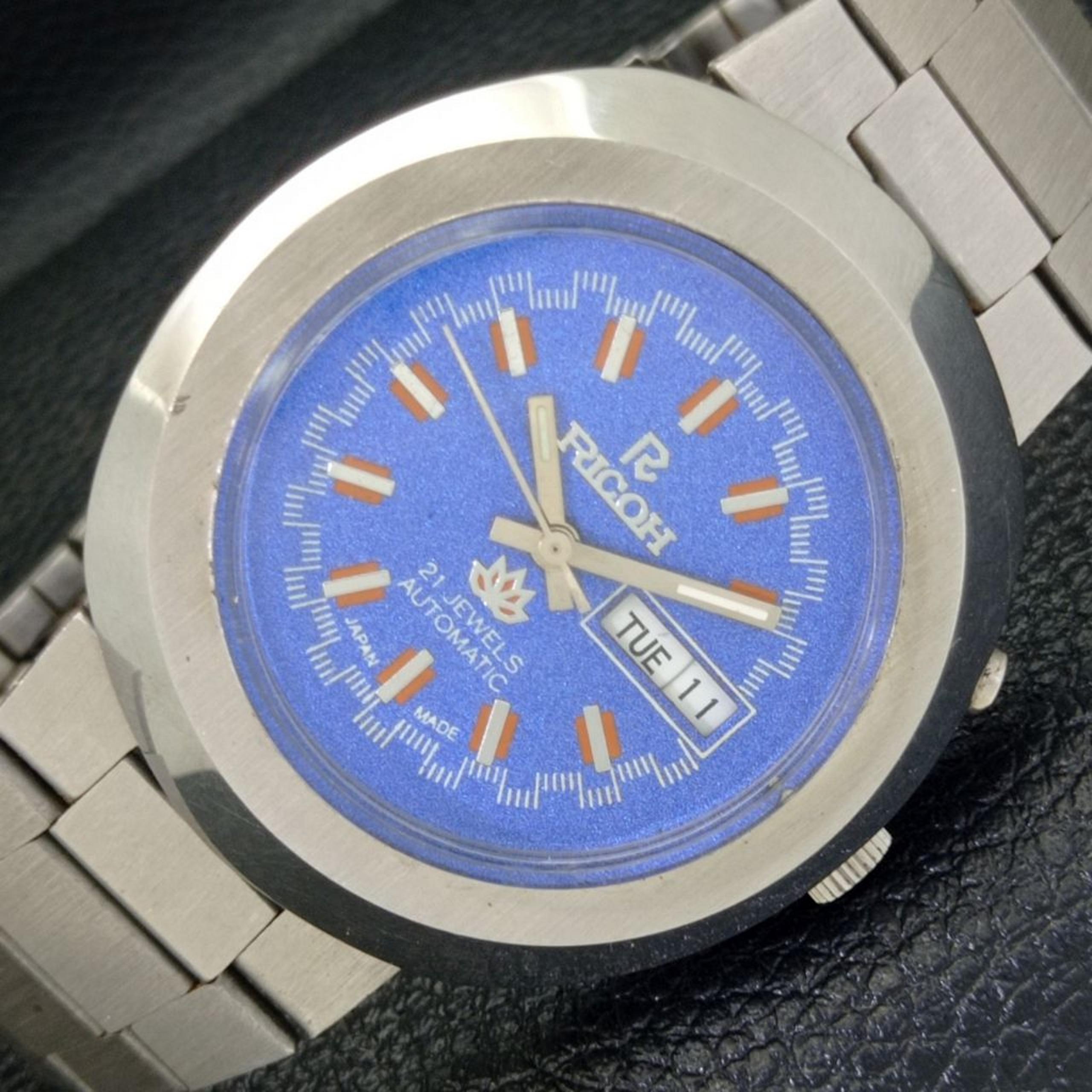 Vintage 1974 Ricoh Automatic Mens Silver Watch W/daydate & Blue accents