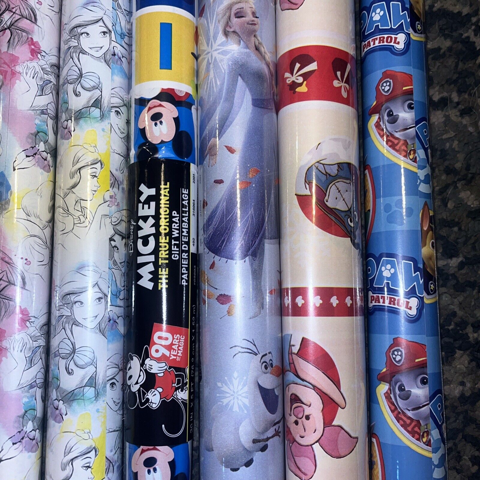 Wrapping Paper 6 Rolls 3 Princesses 1 Mickey Mouse 1Paw Patrol 1 Piglet