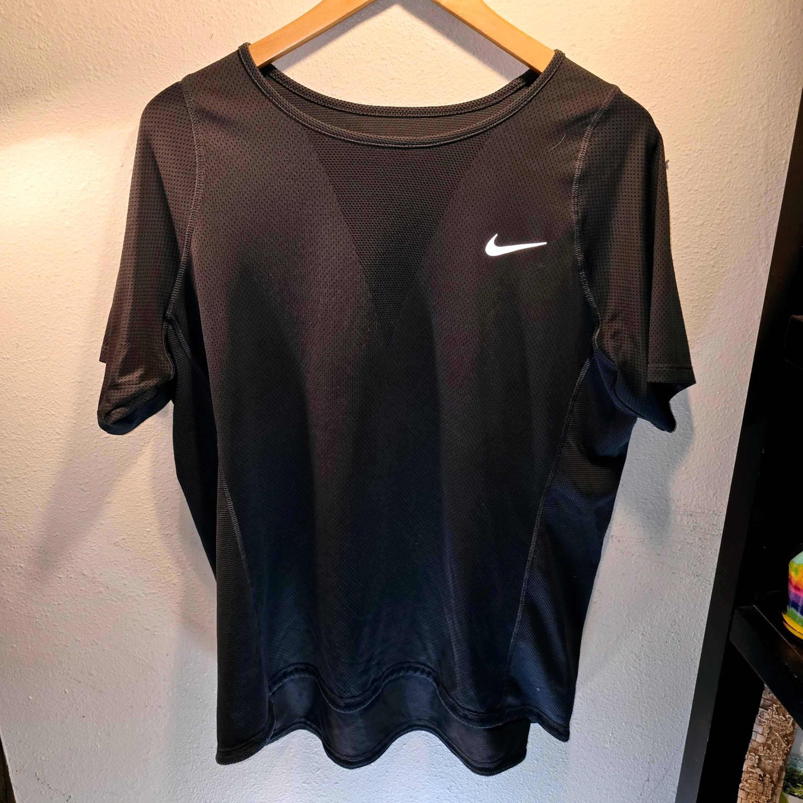 Nike sz. Xlarge black womans athletic tshirt