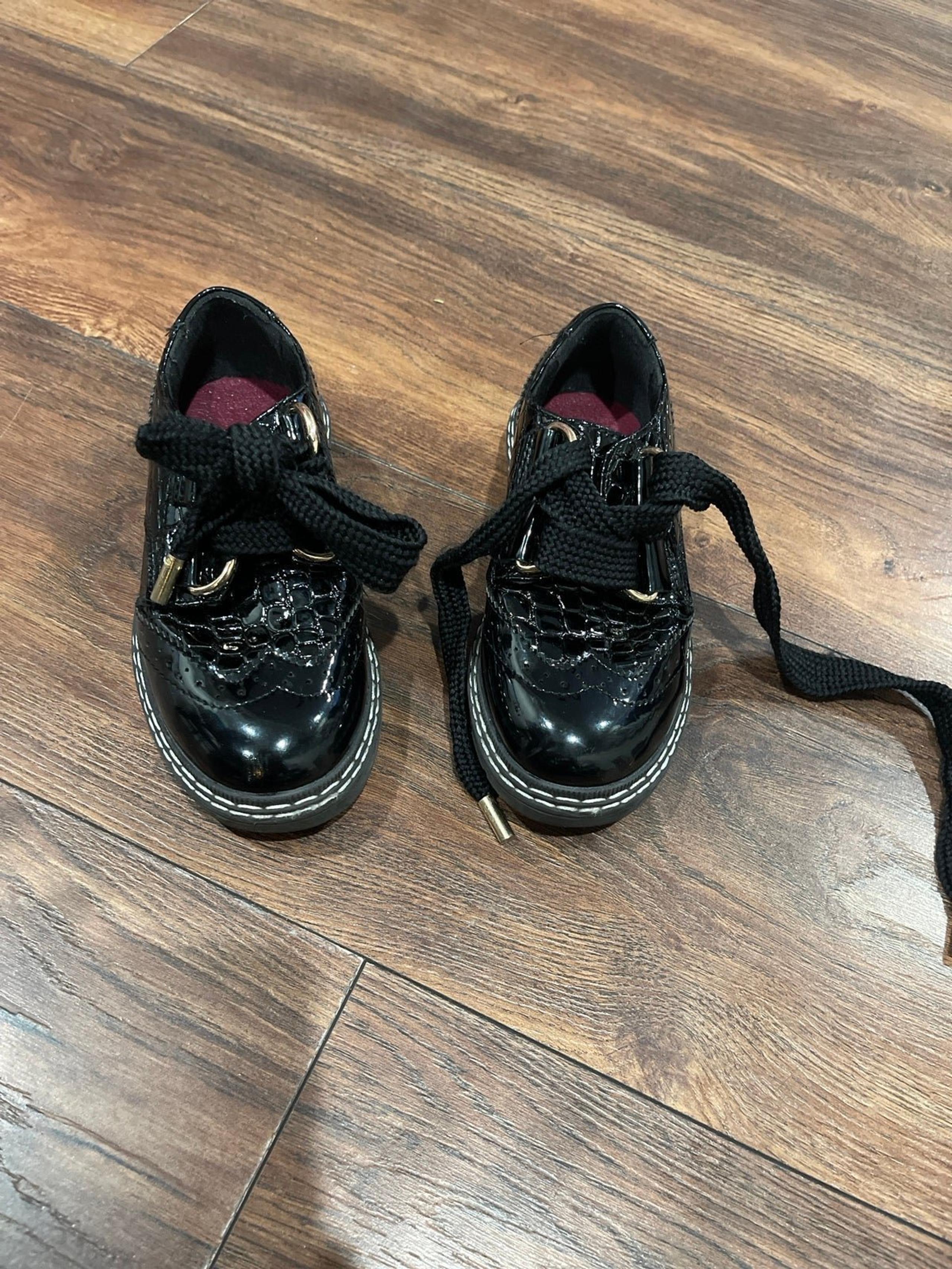 Girls black patent leather boots