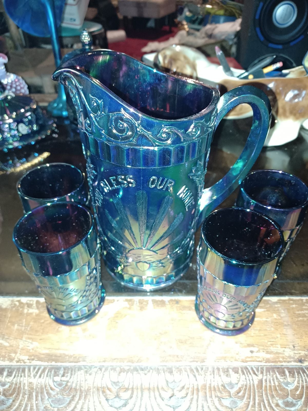 Antique Dugan water pitcher with glasses carnival glass blue
