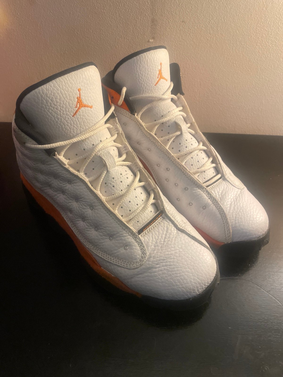 Jordan 13s orange and white