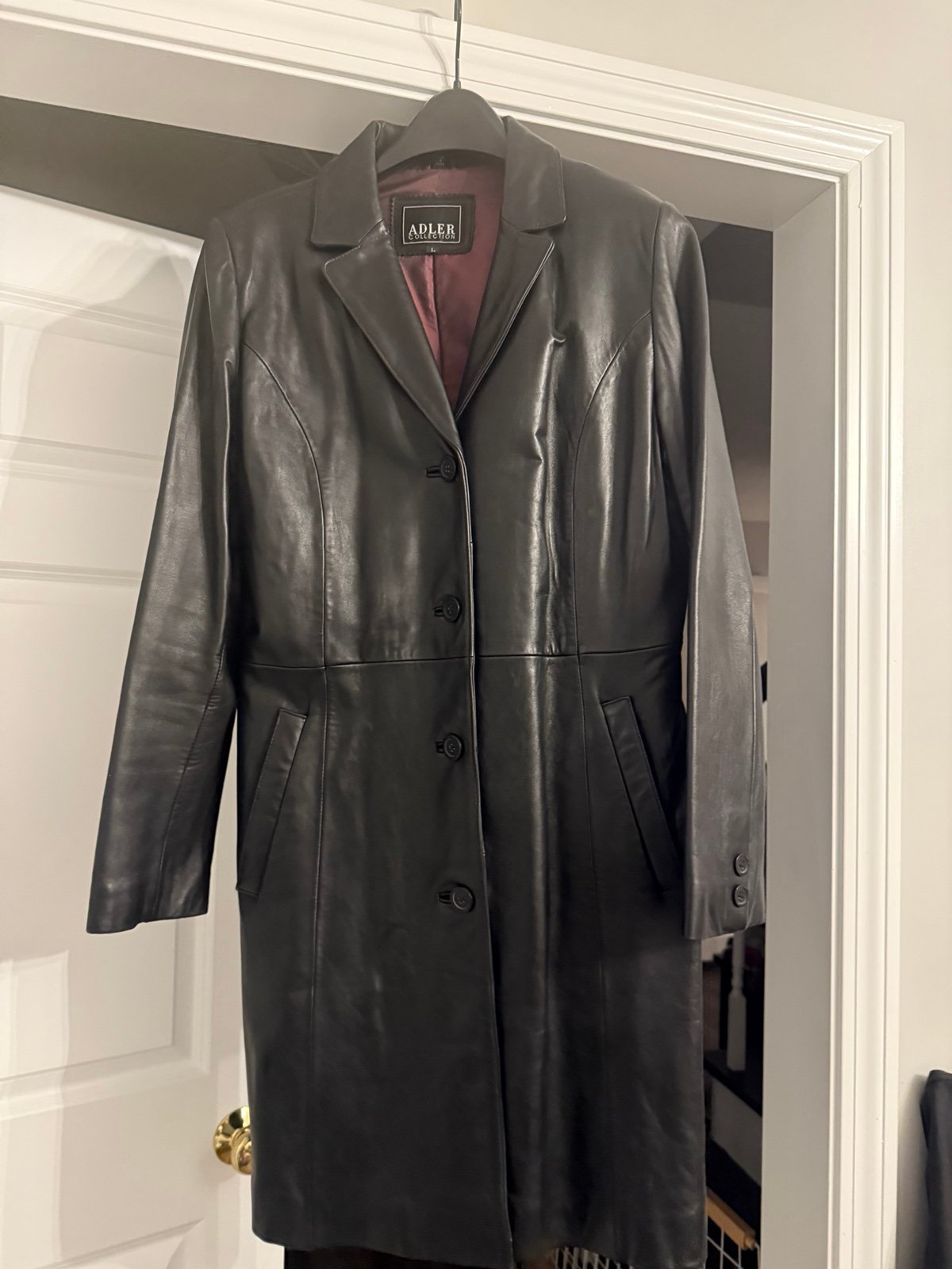 Womens size large black Adler Collection long leather jacket worn once