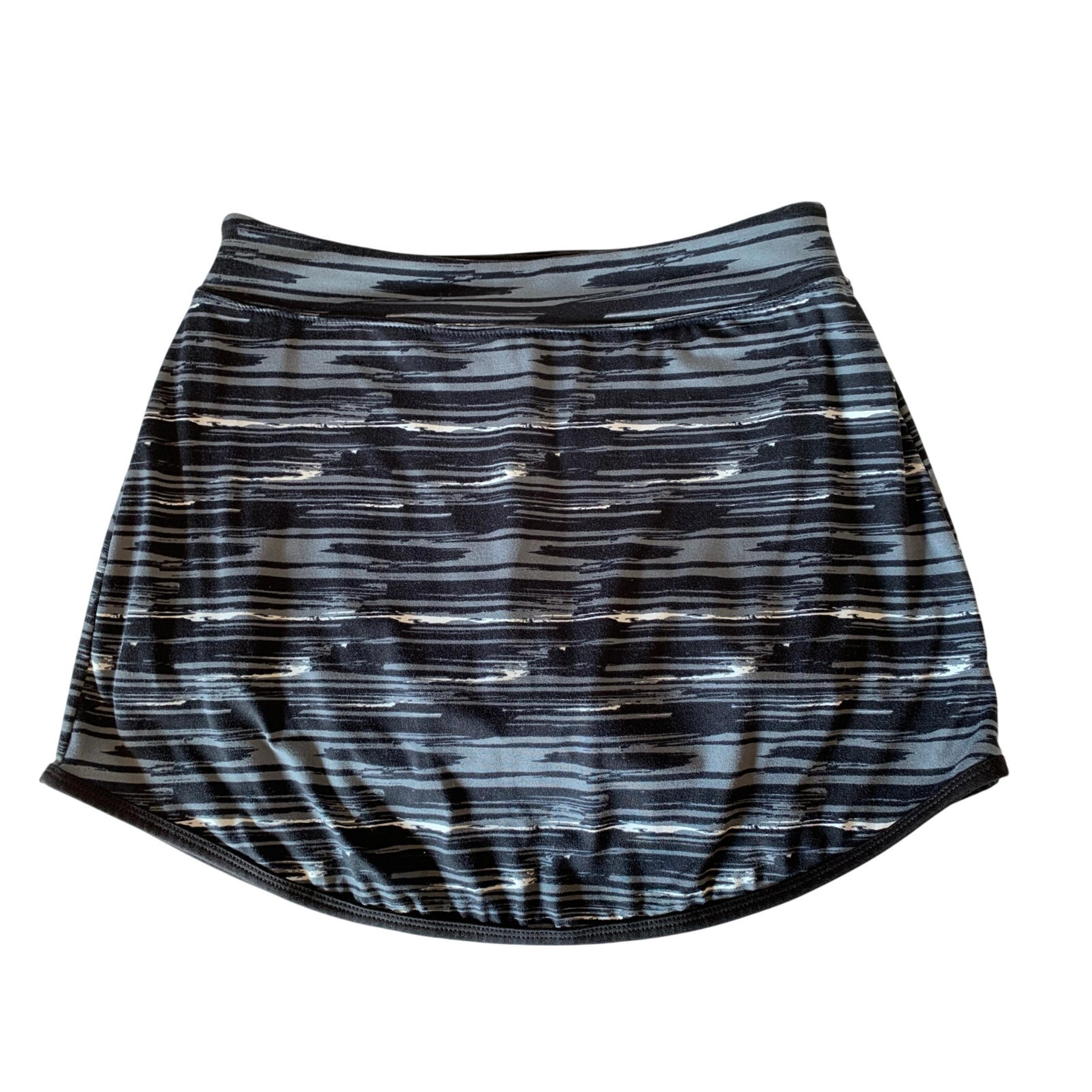 Lola skort size small.  horizontal pattern.  rounded hemline black gray