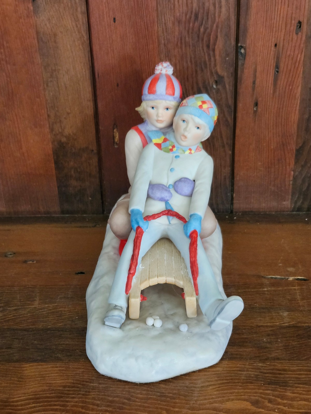 Cybis Porcelain Ned and Nancy Winter Sledding