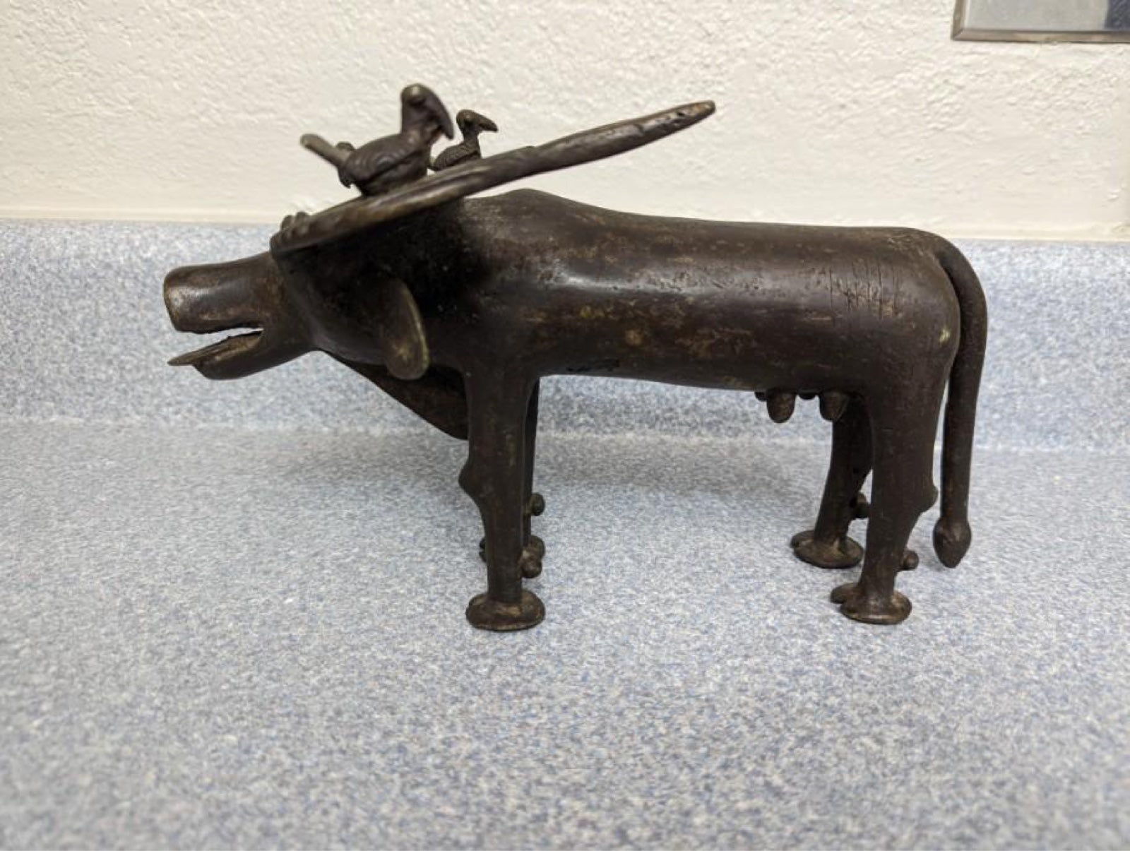 Antique bronze African water buffalo and birds figurine