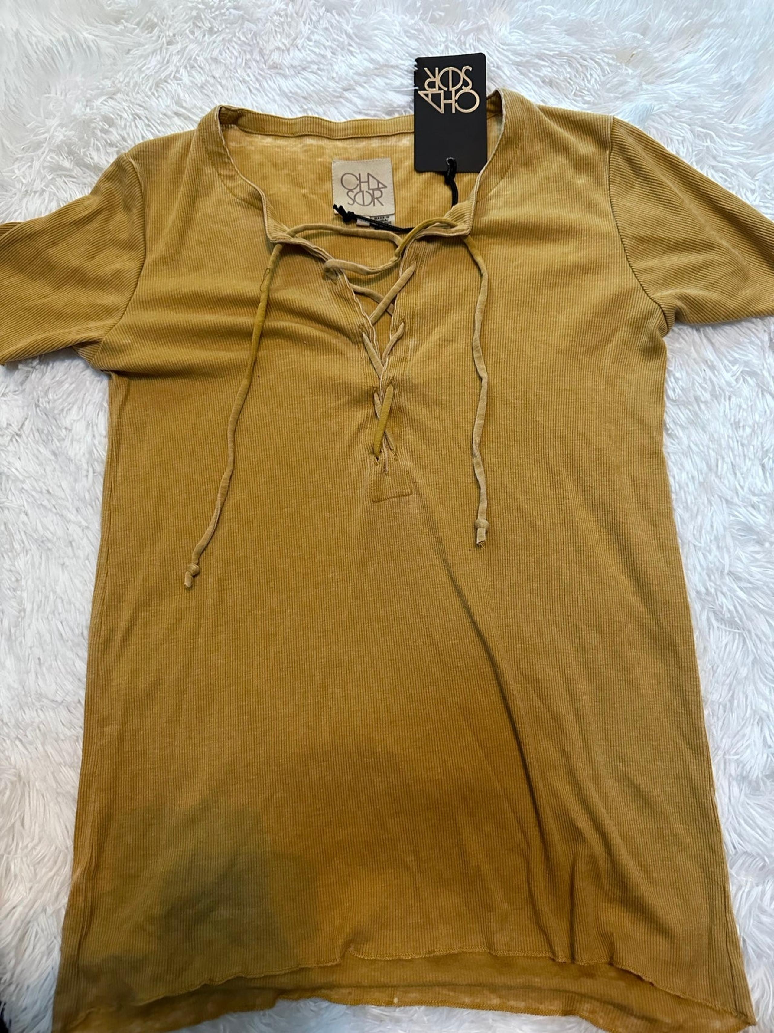 Chaser short sleeve lace up hi low rib tee in color marigold