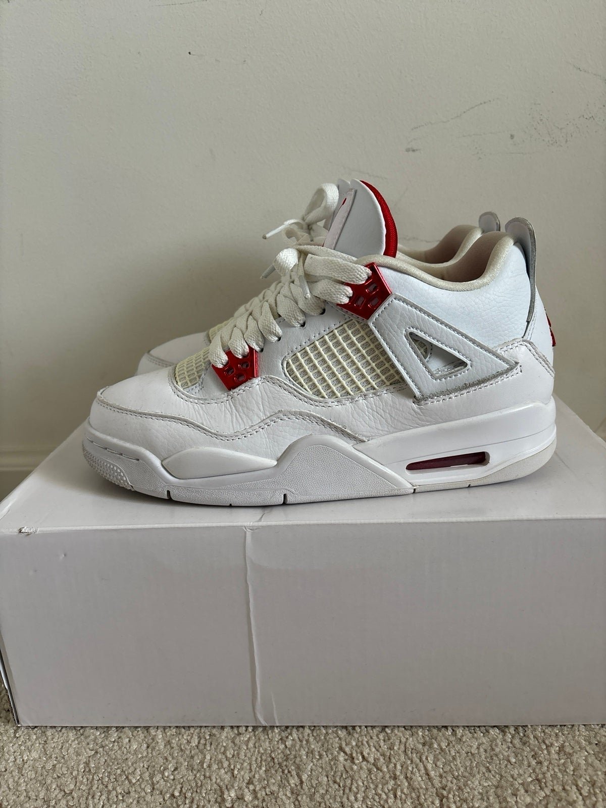 Jordan 4 metallic red