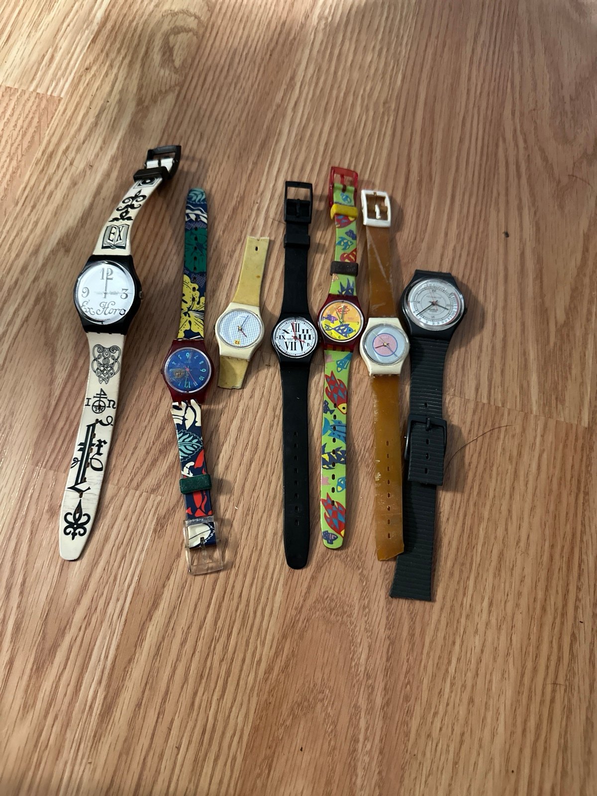 Swatch watch bundles three of them need bands seven of them probably do all bat