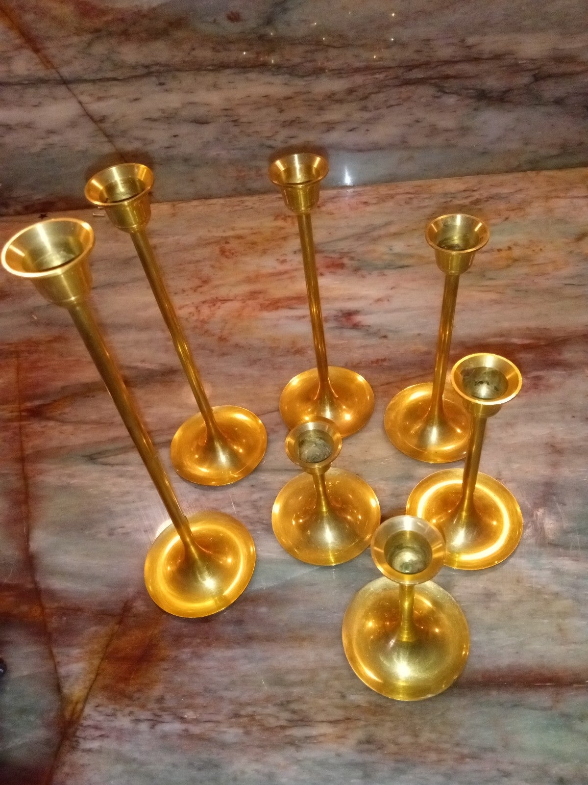 7 brass candle holders