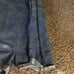 Jean overalls with pockets and hand painted daisies distressed look. Says 3x bu