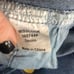 Jean overalls with pockets and hand painted daisies distressed look. Says 3x bu
